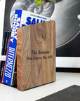 Wooden and metal bookend with black metal