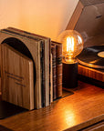 Wooden and metal bookend with black metal