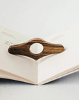 Thumb book page holder