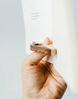 Thumb book page holder