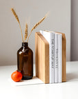 Wooden and metal bookend with white metal