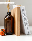 Wooden and metal bookend with white metal