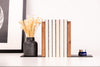 Wooden and metal bookend with black metal