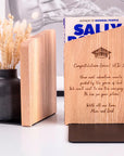 Wooden and metal bookend with black metal