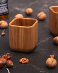 Wooden tumbler with box & stones